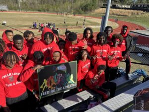 a group photo of raleigh egypt track and field team members